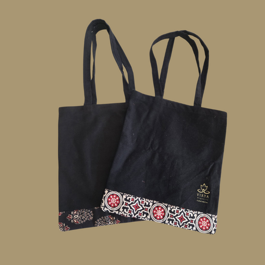 Virya Tote bags